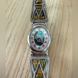 La express ladies oval silver tone abalone watch NEW BATTERY
